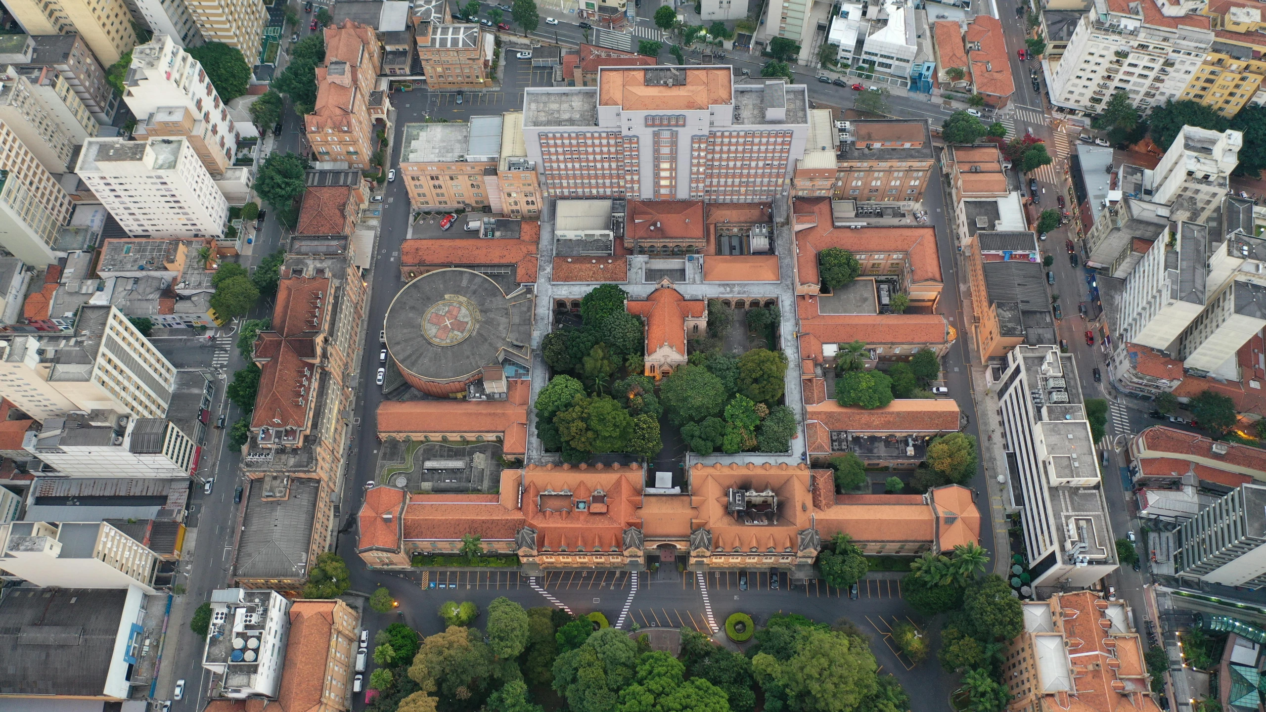 an aerial view of a city with tall buildings, quito school, são paulo, terracotta, prison complex, exterior photo