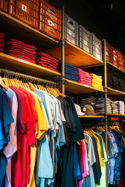 a store filled with lots of different colored shirts, a portrait, trending on unsplash, industrial colours, thumbnail, profile pic