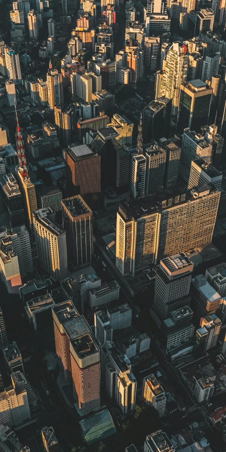 an aerial view of a city with tall buildings, digital art, by Adam Marczyński, unsplash contest winner, profile pic, high angle close up shot, bird\'s eye view, high quality photo