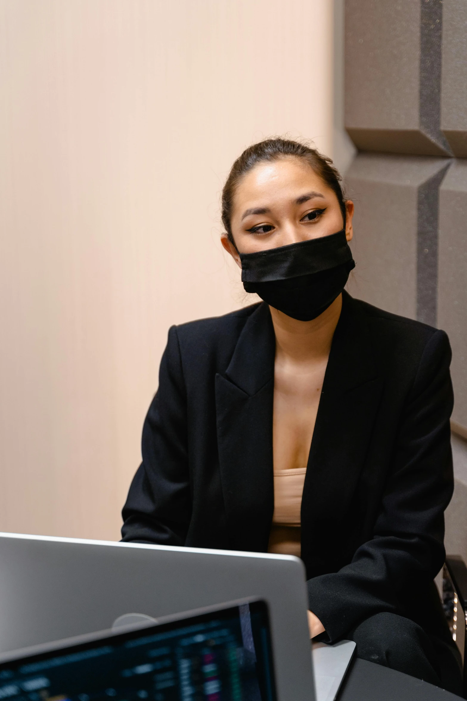 a woman sitting in front of a laptop wearing a face mask, wearing a black noble suit, ashteroth, deayami kojima, high quality image