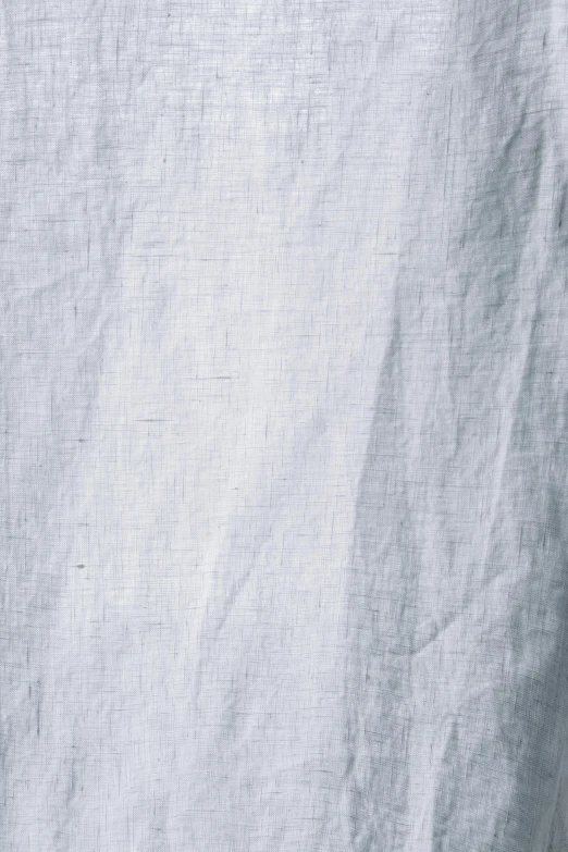 a close up of a plate of food on a table, an album cover, inspired by Agnes Martin, unsplash, figuration libre, fabric texture, light grey, cotton fabric, 1 5 9 5