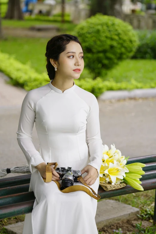 a woman in a white dress sitting on a bench, a picture, inspired by Ruth Jên, pexels contest winner, ao dai, square, 8 k ), biopic