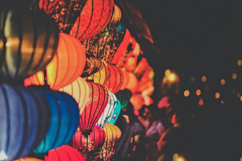 a wall filled with lots of colorful paper lanterns, pexels contest winner, moody lights, vietnam, vintage vibe, teaser