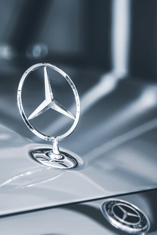 a mercedes logo on the hood of a car, a hologram, pexels contest winner, renaissance, glossy white metal, mini model, on clear background, stainless steel