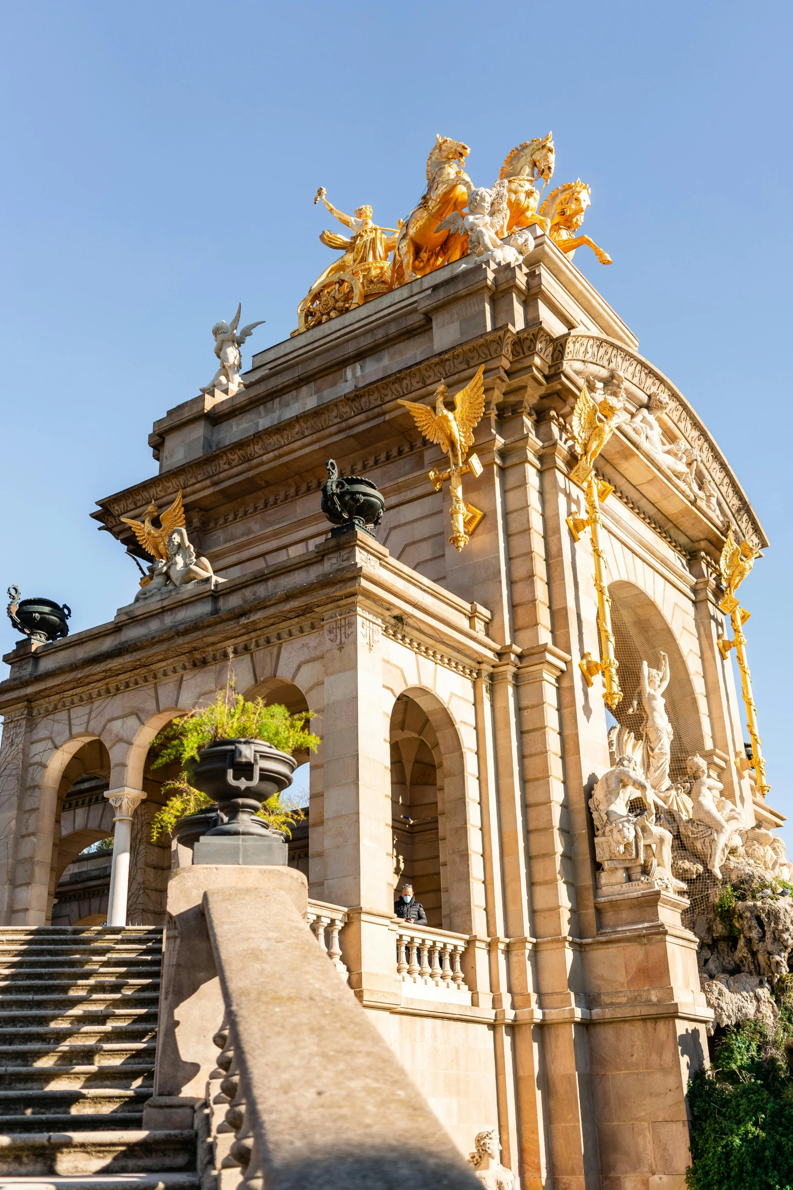 a staircase leading up to the top of a building, a statue, by Gaudi, pexels contest winner, art nouveau, golden arches, 2 5 6 x 2 5 6 pixels, tall golden heavenly gates, carousel