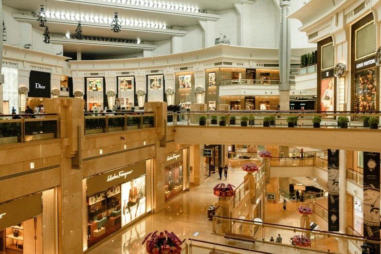 a view of the inside of a shopping mall, renaissance, dubai, medium portrait, fan favorite, gold
