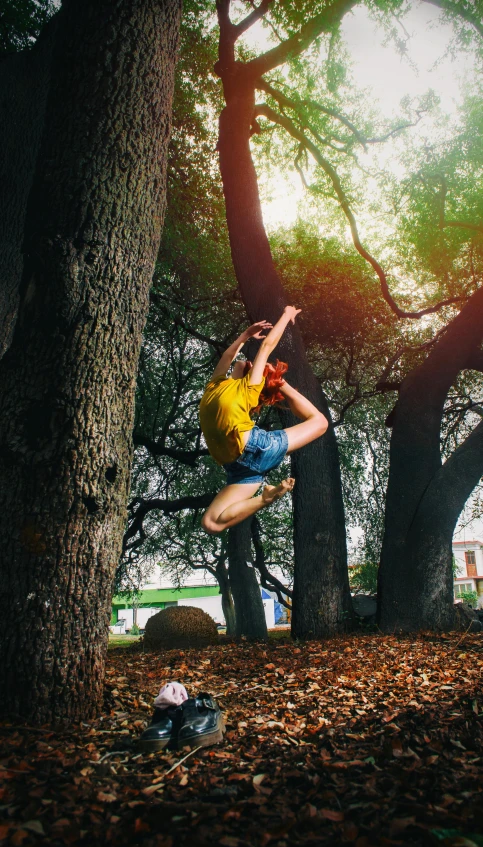 a man flying through the air while riding a skateboard, by Sven Erixson, pexels contest winner, arabesque, swing on a tree, martial artist dryad, a wooden, immature