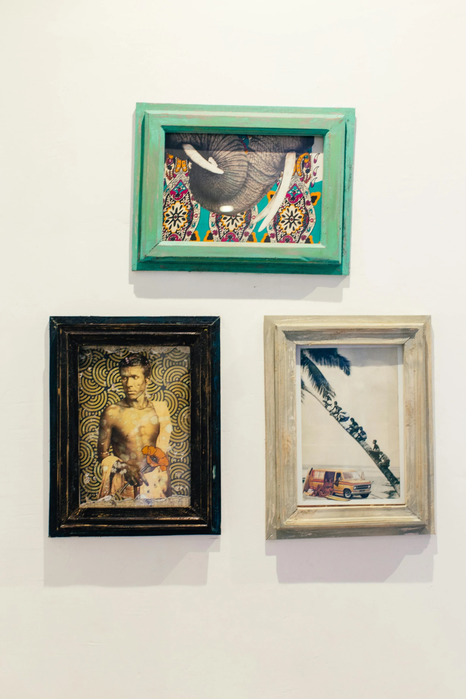 a couple of framed pictures hanging on a wall, dada, decollage, jen yoon, mahmud barzanji, karma