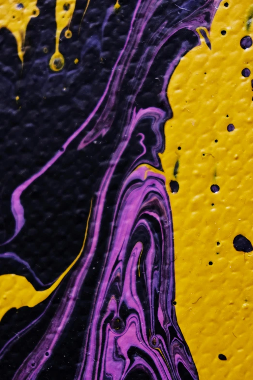 a close up of a painting on a wall, a pop art painting, trending on pexels, abstract expressionism, purple and yellow, made of liquid purple metal, black and yellow, canvas