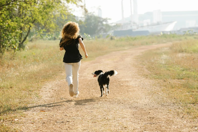 a little girl running down a dirt road with a dog, surrounding the city, black, 15081959 21121991 01012000 4k, instagram post