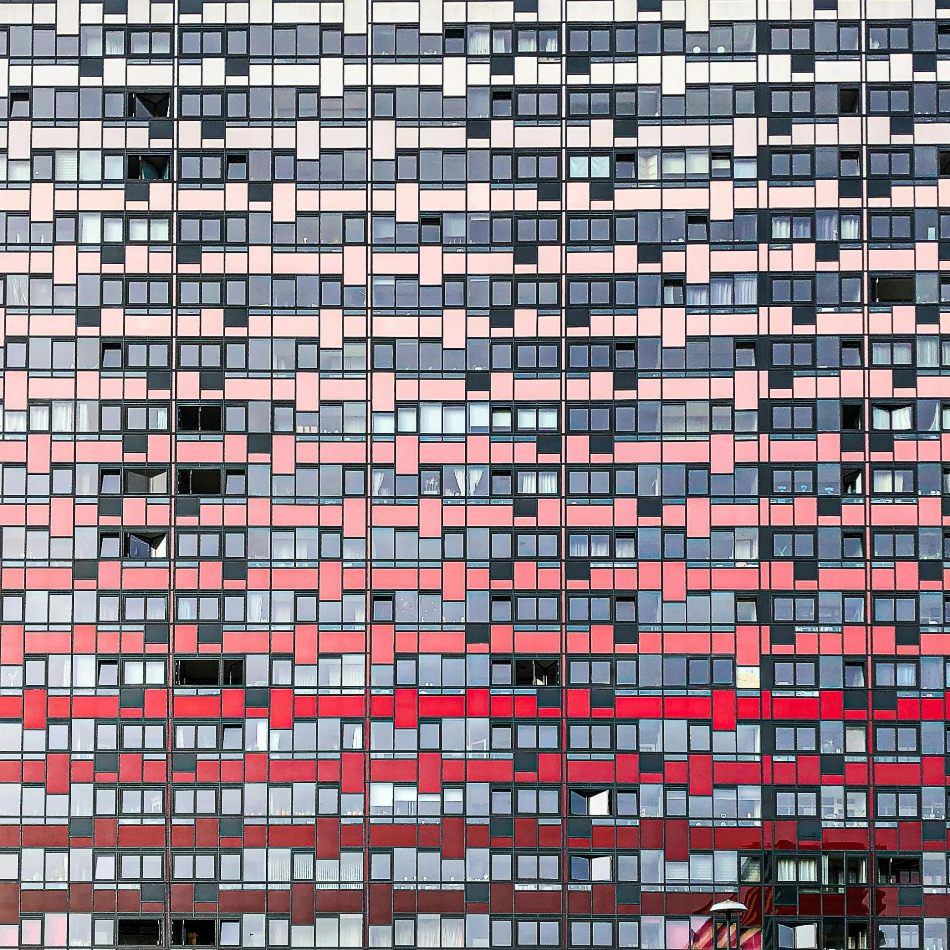 a very tall building with a lot of windows, inspired by Andreas Gursky, unsplash, red and grey only, karim rashid, kreuzberg, gradation