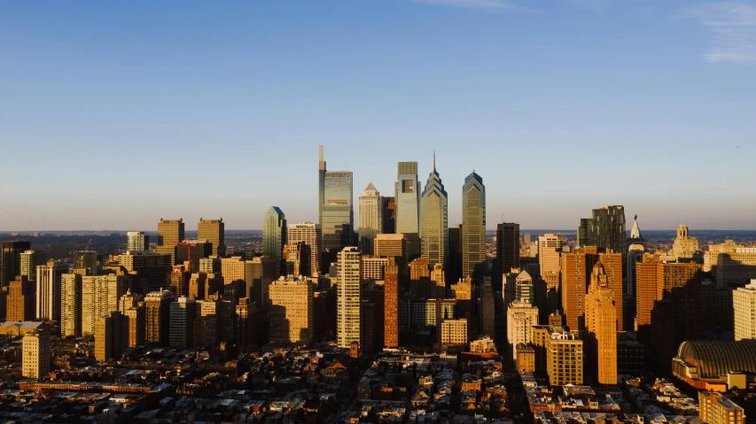 a large city with a lot of tall buildings, by Jacob Burck, pexels contest winner, always sunny in philadelphia, gigapixel photo, morning light showing injuries, skyline showing