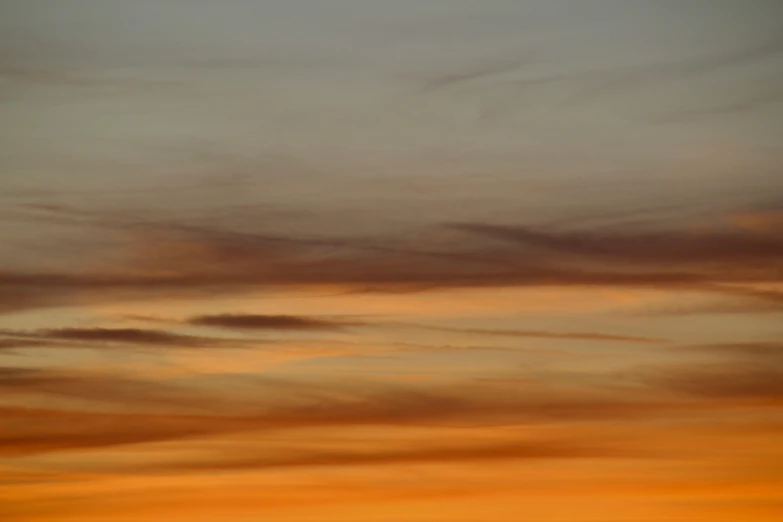 a plane flying in the sky at sunset, by Ian Fairweather, tonalism, an abstract, grey orange, soft light - n 9, dynamic sky