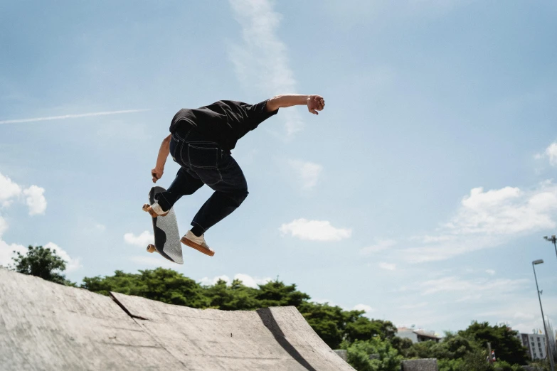 a man flying through the air while riding a skateboard, pexels contest winner, happening, 15081959 21121991 01012000 4k, hd footage, harriet tubman skateboarding, doing a backflip