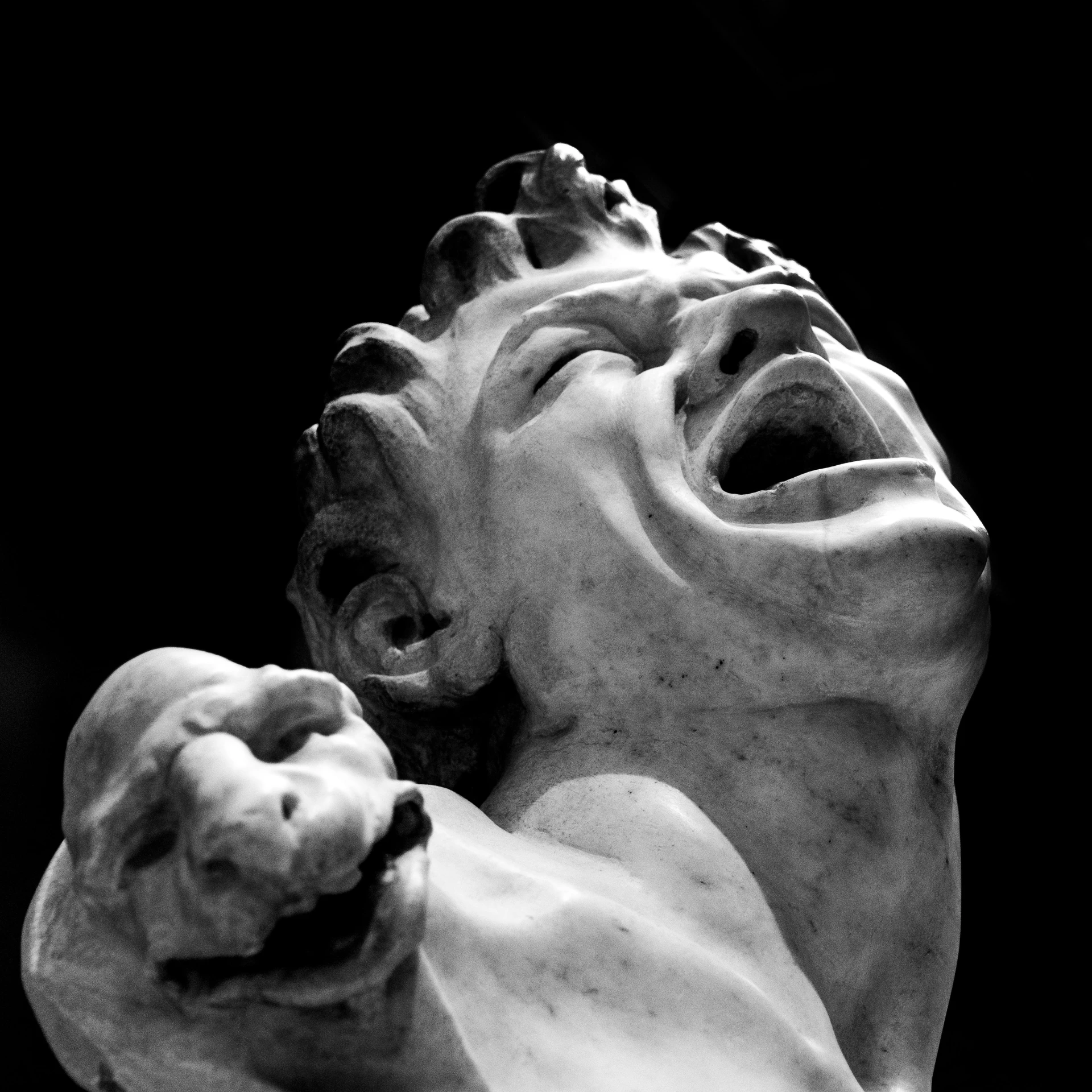 a black and white photo of a statue with its mouth open, a marble sculpture, by Gian Lorenzo Bernini, pexels contest winner, screaming in agony, 188216907, michelangelo sculpture, funny sculpture