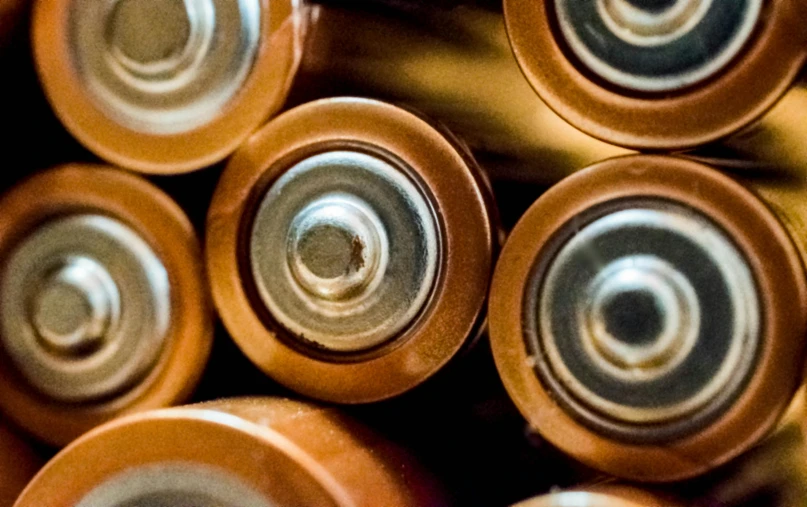a pile of batteries sitting on top of each other, by Thomas Häfner, pexels, intricate copper details, streamlined spines, circular, thumbnail