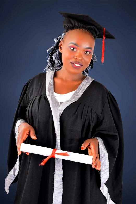 a woman in a graduation gown holding a diploma, a portrait, by Chinwe Chukwuogo-Roy, pexels, 15081959 21121991 01012000 4k, professional studio photo, mongezi ncaphayi, high details!
