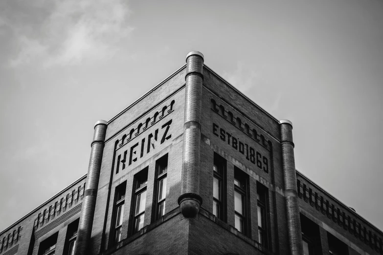 a black and white photo of a building, inspired by Heinrich Herzig, pexels contest winner, advertising photo, 1 9 0 0's photo, hartper's bazaar, krenz