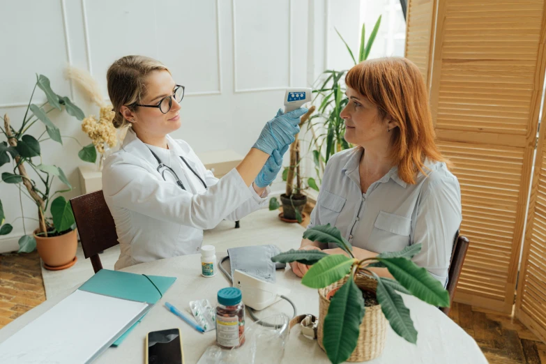 two women sitting at a table in a doctor's office, pexels contest winner, inspect in inventory image, avatar image, background image, botany