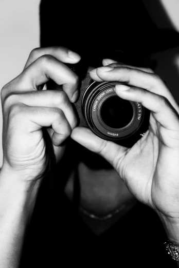 a person taking a picture with a camera, a black and white photo, mana shooting from his hands, ((sharp focus)), profile picture 1024px, close-up!!!!!