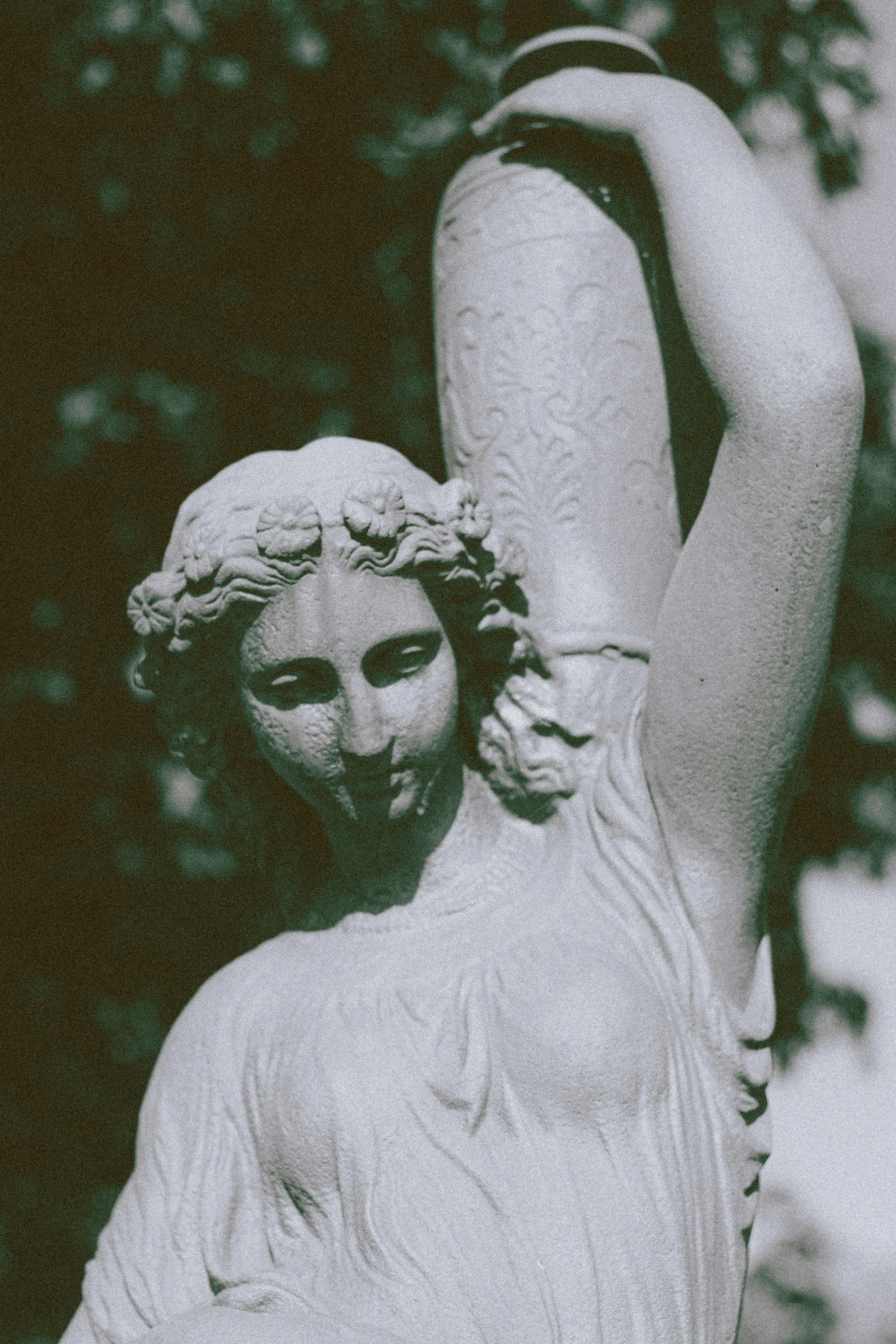 a black and white photo of a statue, inspired by Gustave Boulanger, unsplash, photographed on colour film, waving, young lady, closeup of arms