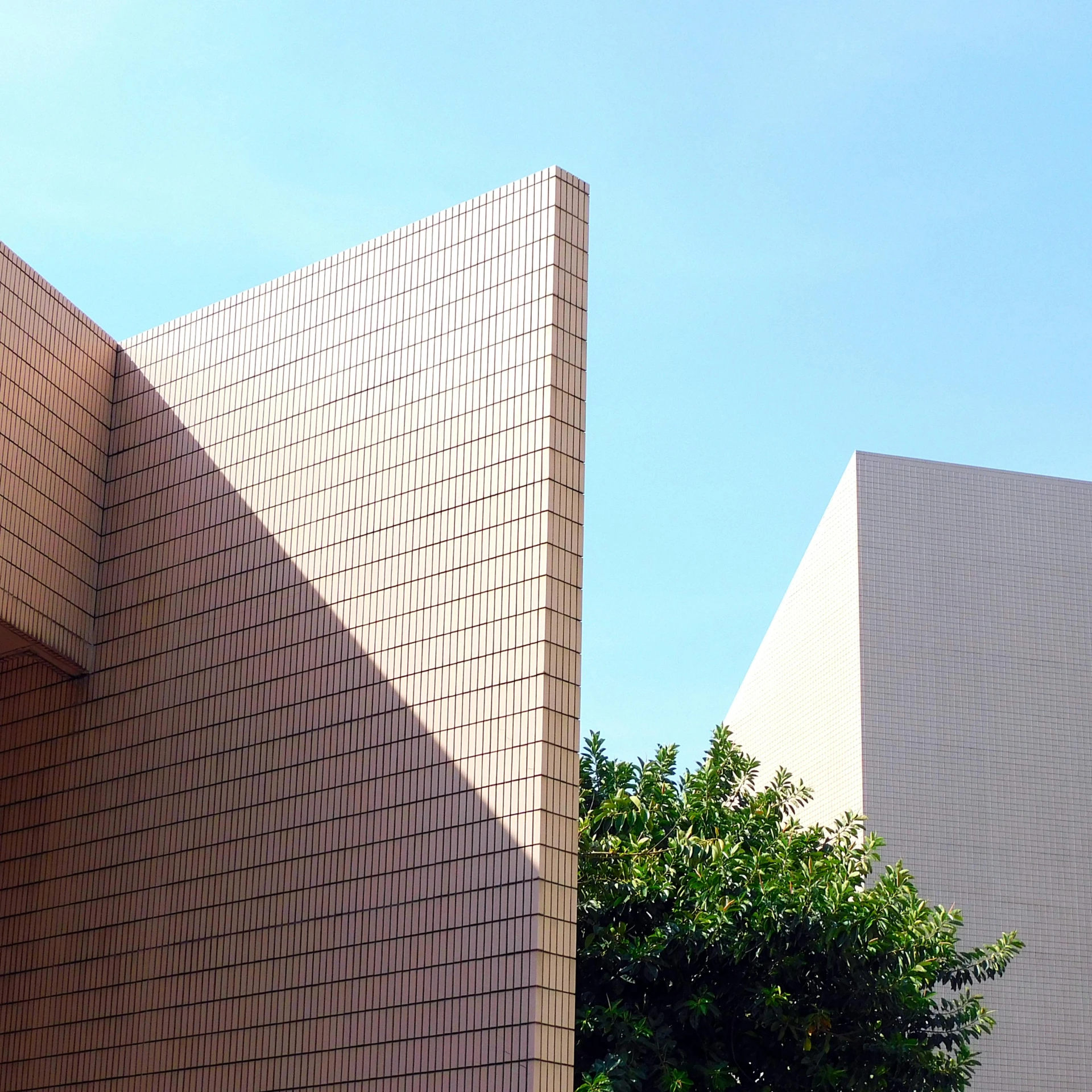 a red fire hydrant sitting in front of a building, inspired by David Chipperfield, modernism, light - brown wall, seen from below, shin jeongho, abstract facades of buildings