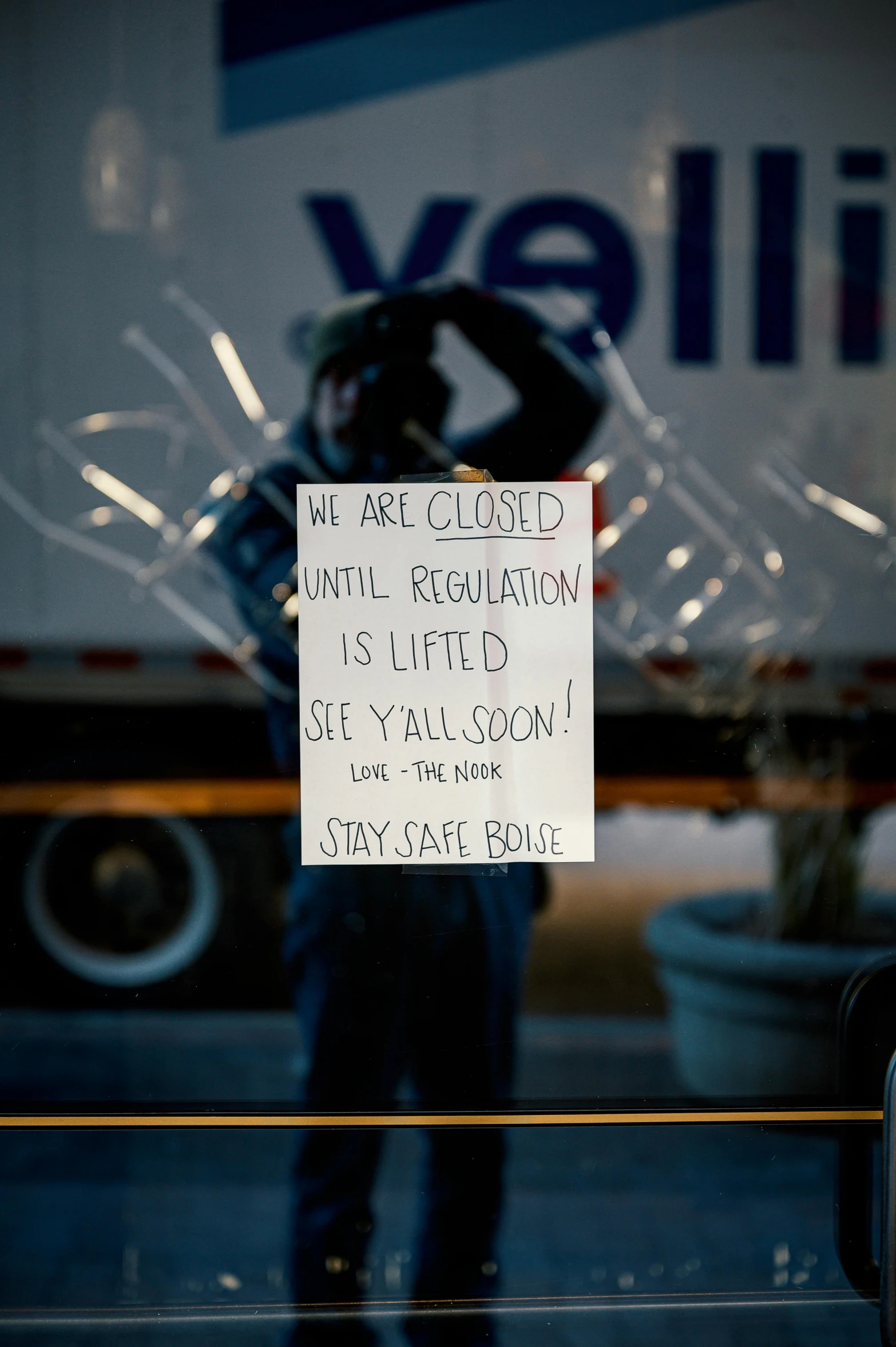 a sign that reads, we are closed until regulation is lifted see you soon stay safe police, by William Berra, unsplash, alec soth : : love, view from a news truck, photograph credit: ap, at the counter