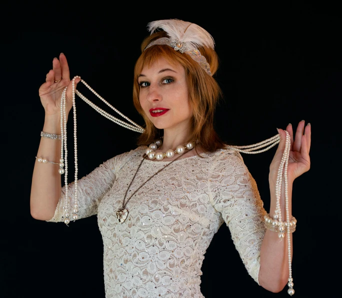 a woman in a white dress holding a bunch of pearls, inspired by Hedda Sterne, pixabay contest winner, wearing a chocker and cute hat, 1920s studio lighting, macrame, various posed