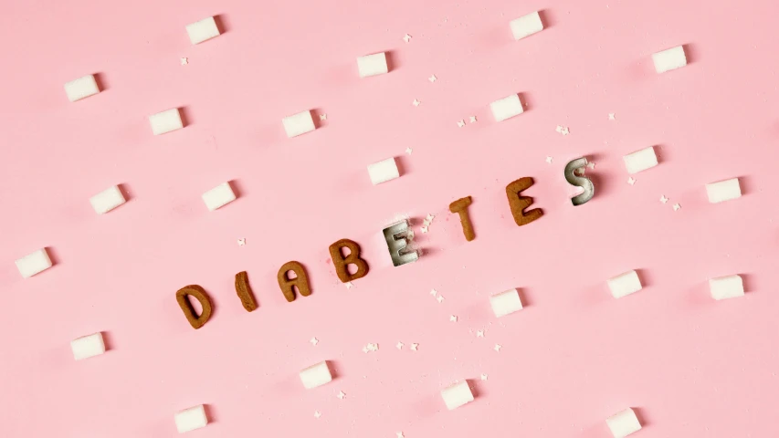 the word diabetes spelled with sugar cubes on a pink background, an album cover, by Daniel Lieske, trending on pexels, graffiti, 4k polymer clay food photography, 🎀 🍓 🧚, white ribbon, rebecca sugar