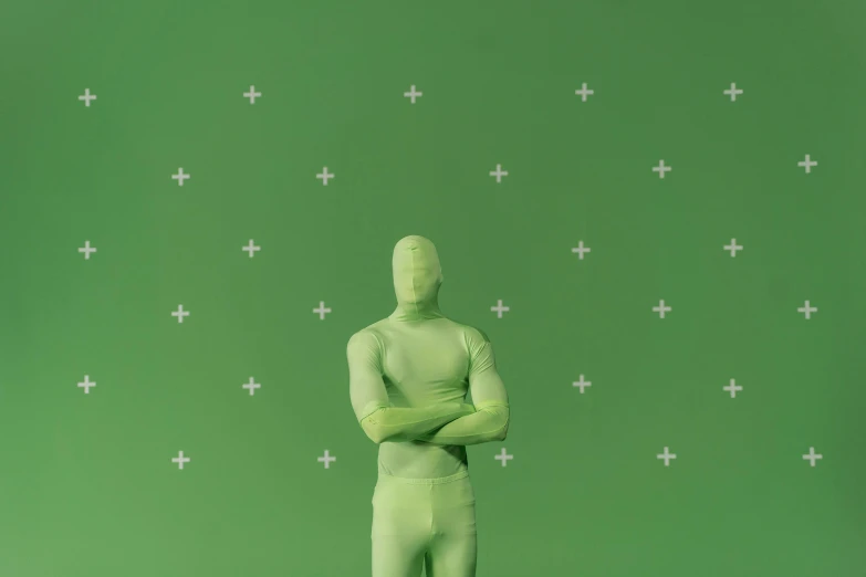 a statue of a man standing in front of a green background, by Attila Meszlenyi, trending on polycount, zentai suit, personal room background, suit made of stars, minimalist background