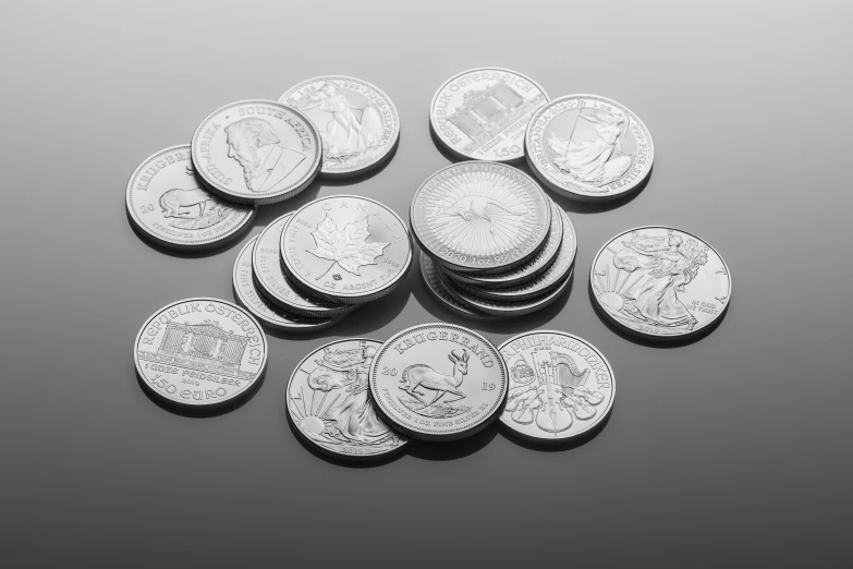 a pile of coins sitting on top of a table, an ambient occlusion render, inspired by Alexander Scott, renaissance, detailed product shot, silver gelatine realistic, high detail product photo, sardax