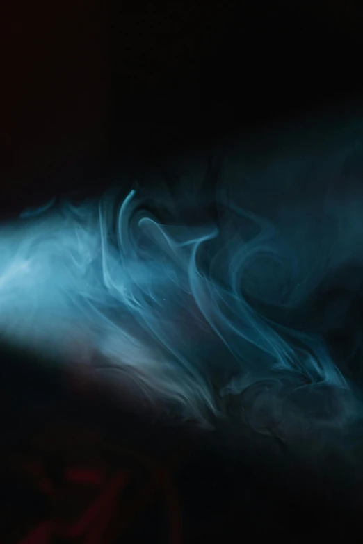 a close up of a light in a dark room, inspired by Kim Keever, pexels contest winner, light and space, bright blue smoke, ilustration, ground mist swirling vortexes, background ( dark _ smokiness )