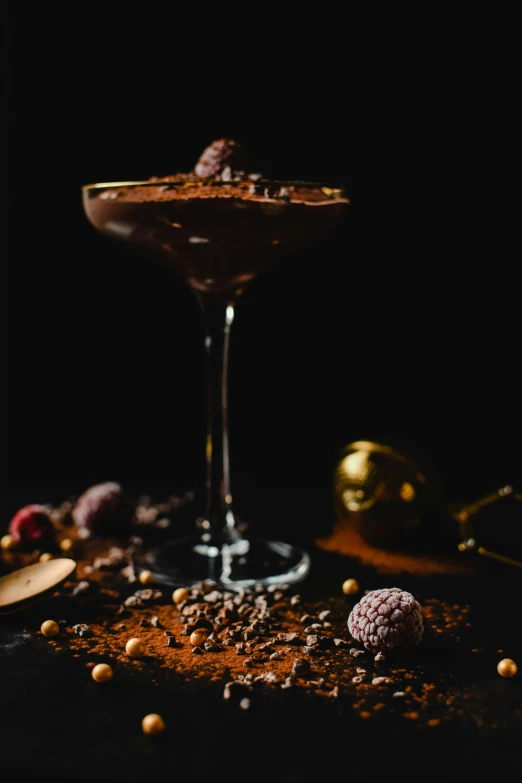a chocolate martini sitting on top of a table, a still life, by Ndoc Martini, pexels, award winning dark, with sparkling gems on top, profile, farming