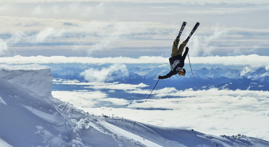 a man flying through the air while riding skis, pexels contest winner, figuration libre, new zeeland, craig mullins style, doing a backflip, towering high up over your view