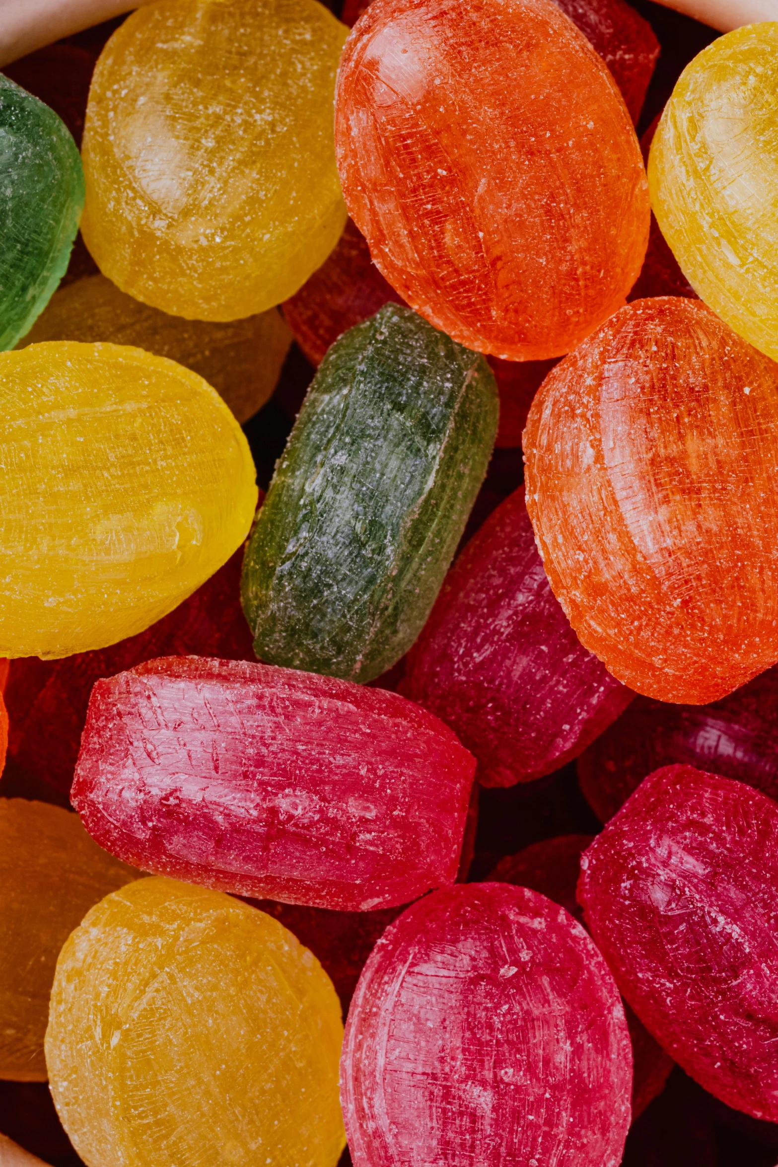 a bowl filled with lots of different colored candies, inspired by david rubín, renaissance, neck zoomed in, corduroy, various sizes, jelly - like texture