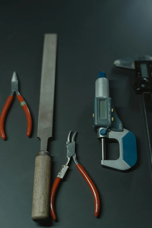 a group of tools sitting on top of a table, cinematic shot ar 9:16 -n 6 -g, video still, high quality photo, holding daggers