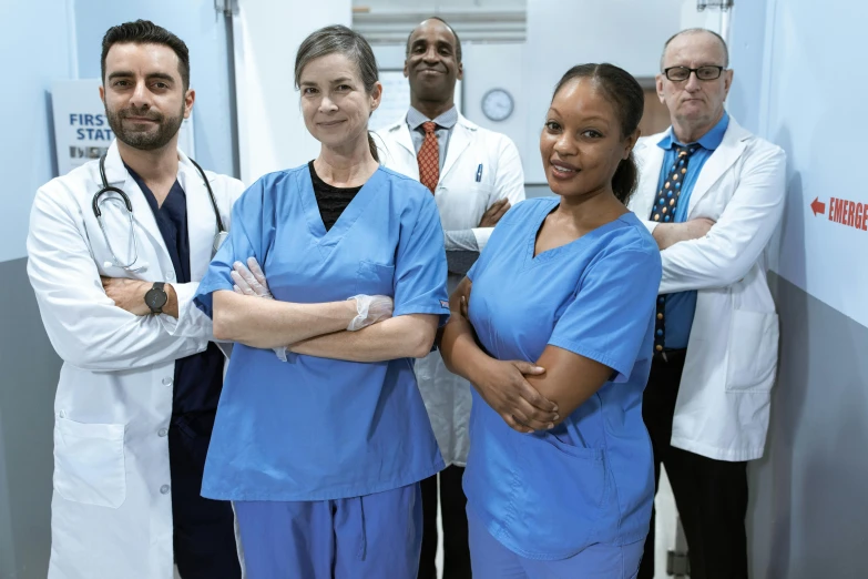 a group of doctors standing next to each other, renaissance, squad, profile image, thumbnail, surgical gown and scrubs on