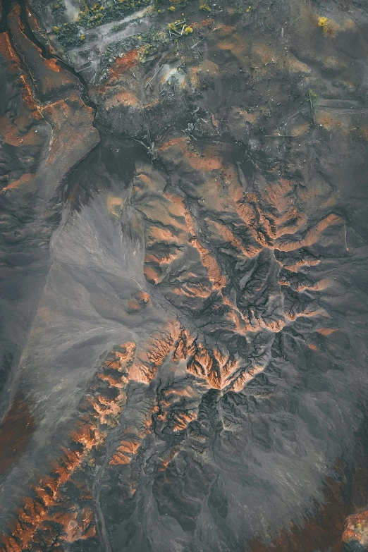 an aerial view of a mountain range, unsplash contest winner, land art, martian city, tehran, view from space, high textured