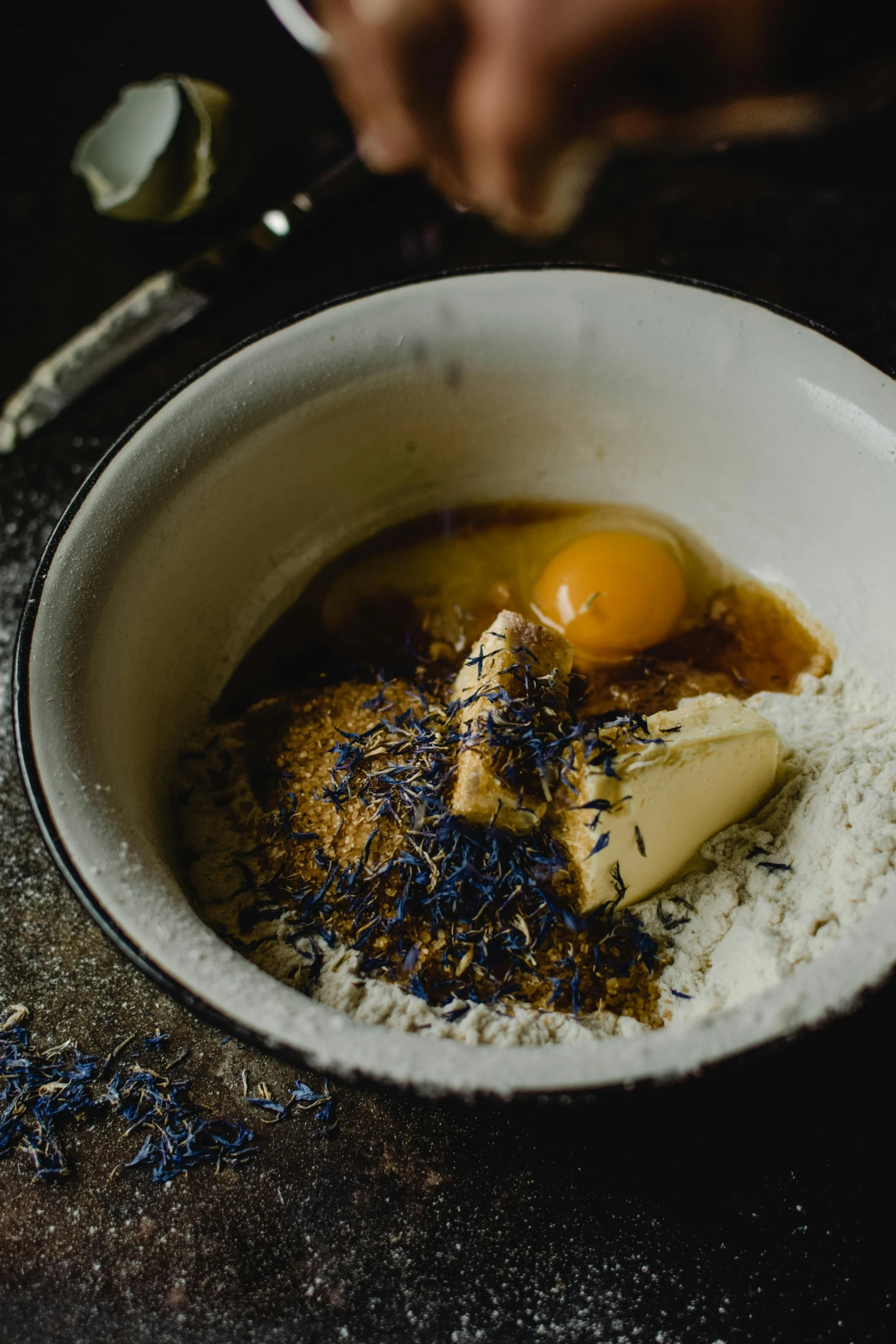 a person mixing ingredients in a bowl on a table, a portrait, unsplash, renaissance, desserts, lavender, kintsugi!!, melbourne