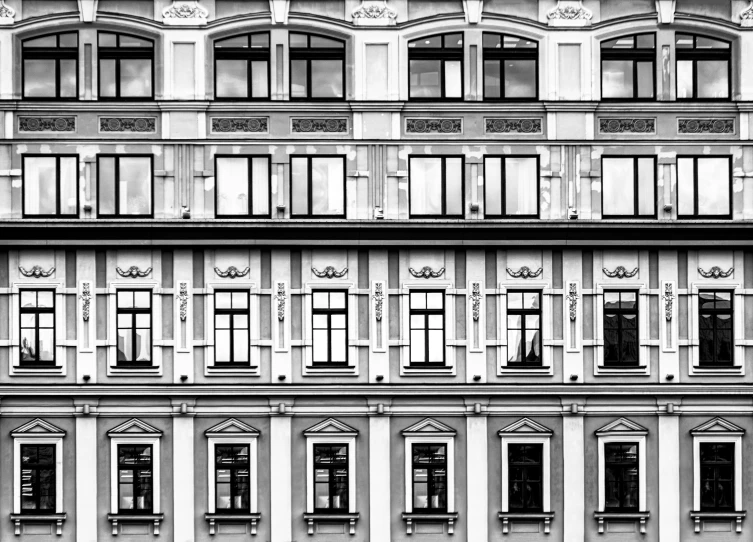 a black and white photo of a building, by Konrad Witz, pexels contest winner, baroque, house windows, shot on 1 5 0 mm, left right symmetry, vibrant and vivid