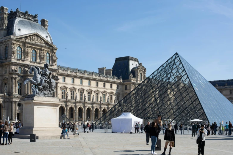 a group of people standing in front of a building, visual art, on display in the louvre, slide show, square, a cozy