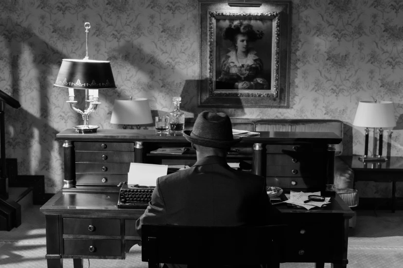 a black and white photo of a man sitting at a desk, inspired by Wojciech Siudmak, female spy, 4k masterpiece, busy room, gettyimages