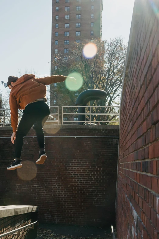 a man flying through the air while riding a skateboard, by Jacob Toorenvliet, cinematic lut, bricks flying, high walls, looking to the right