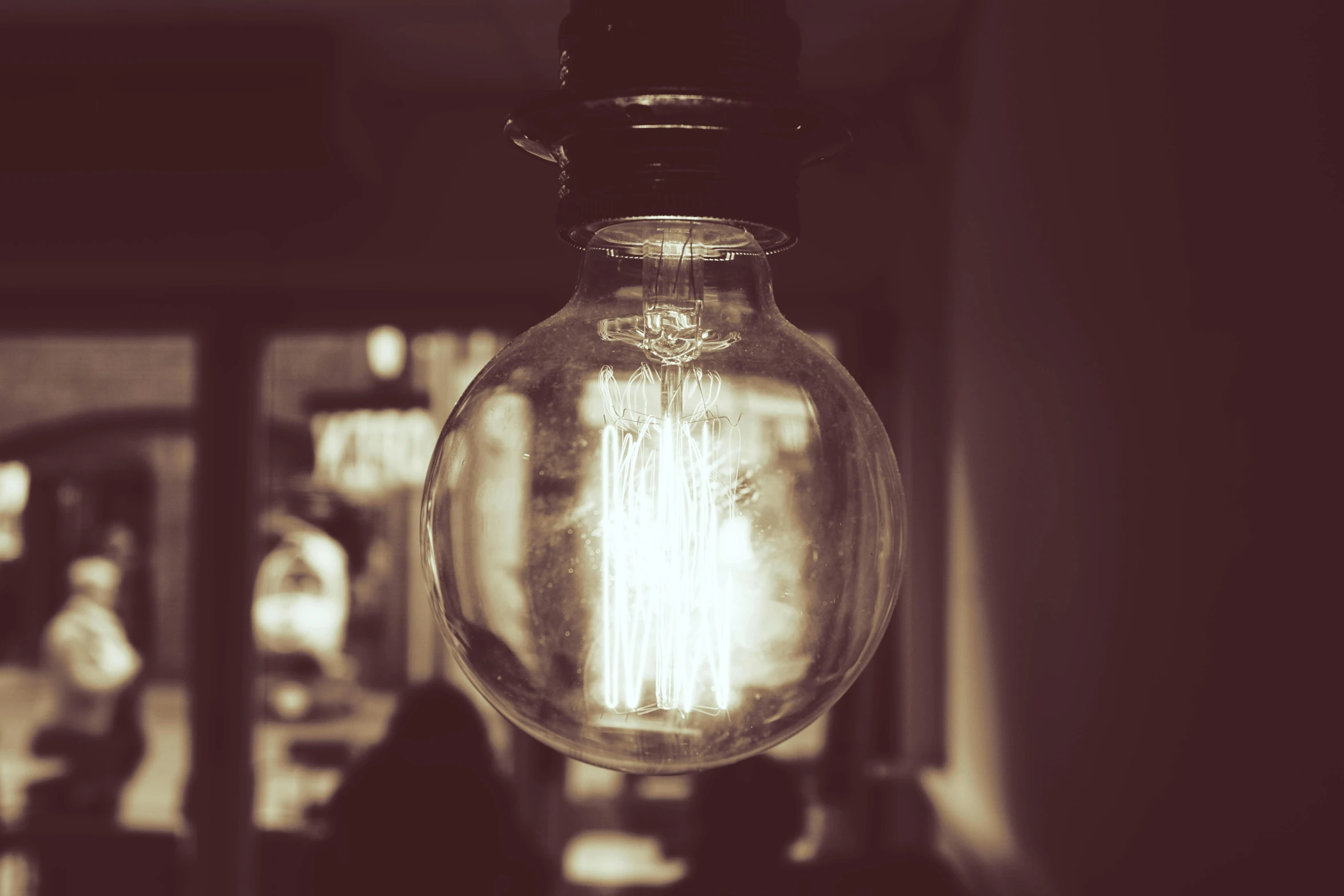 a black and white photo of a light bulb, unsplash, old sepia photography, cafe lighting, neon lamp, instagram photo