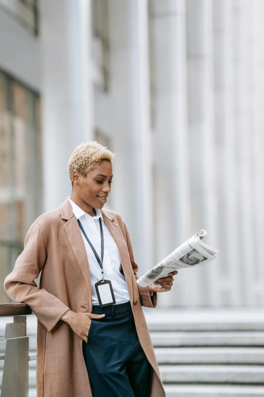 a man standing on the steps of a building reading a newspaper, a cartoon, trending on unsplash, renaissance, african american young woman, girl in a suit, a blond, light brown coat