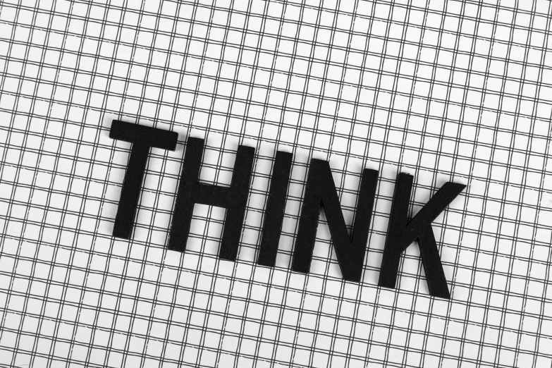 a piece of paper with the word think written on it, a stock photo, trending on pixabay, graffiti, montage of grid shapes, black and white color aesthetic, military, silicone patch design