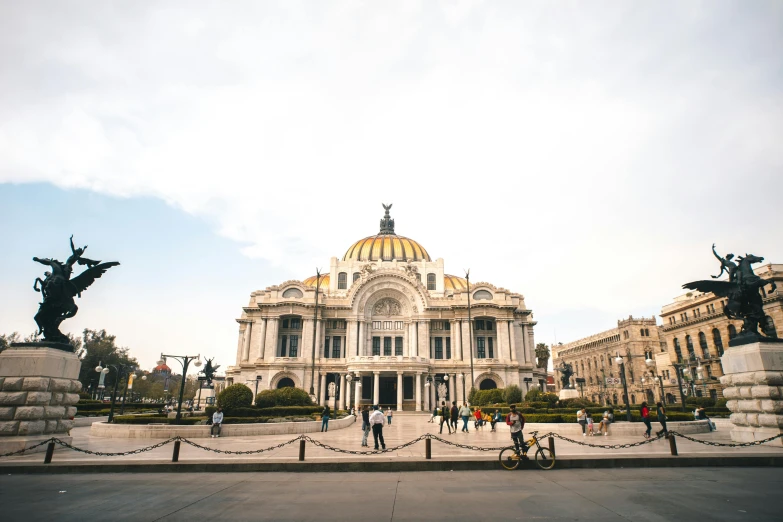 a group of people standing in front of a building, by Alejandro Obregón, pexels contest winner, neoclassicism, tacos, square, khedival opera house, with great domes and arches