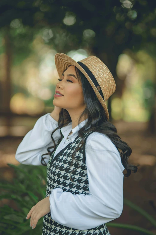 a woman wearing a hat standing in a forest, an album cover, inspired by Fernando Amorsolo, pexels contest winner, renaissance, wearing a white button up shirt, profile image, victorian style costume, woman with black hair