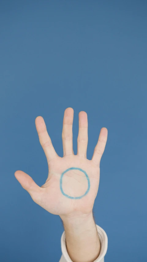 a hand with a blue circle painted on it, inspired by Giotto, trending on pexels, symmetrically, 4k photo”, square, five-dimensional