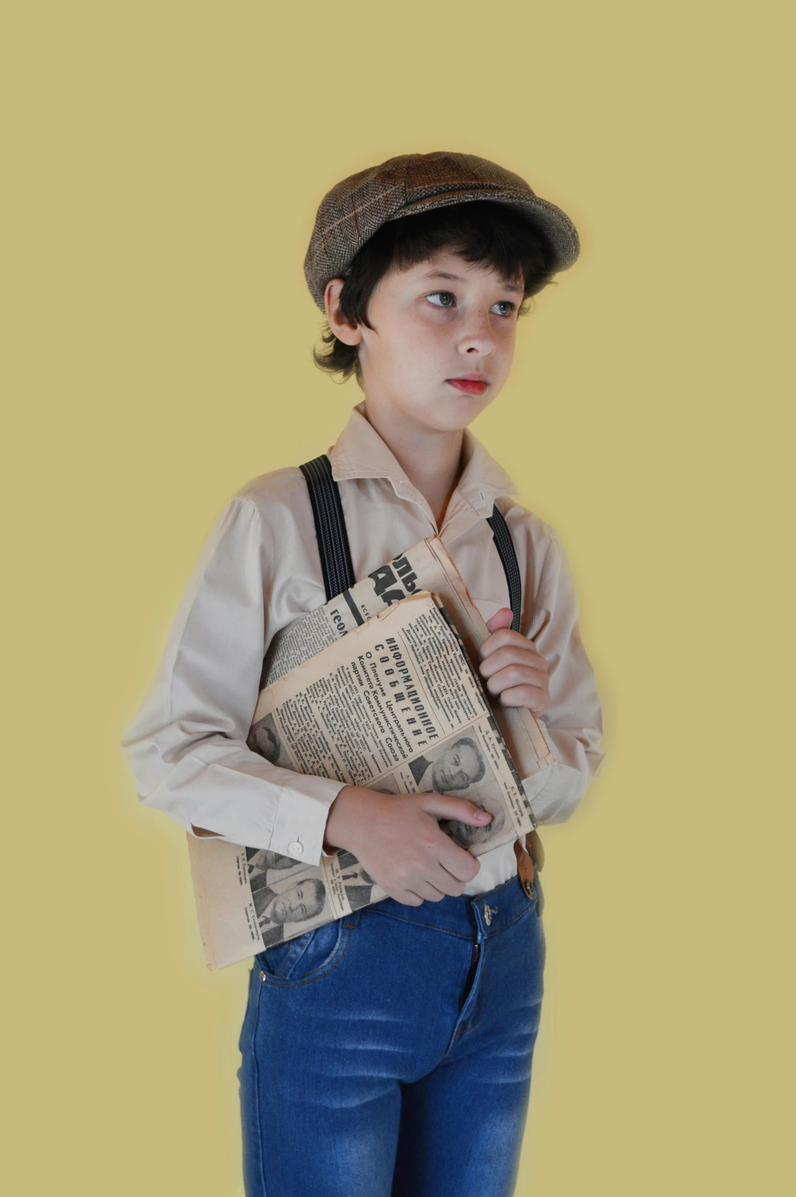 a young boy wearing a hat and holding a newspaper, an album cover, inspired by Norman Rockwell, trending on reddit, official screenshot, suspenders, hollywood promotional image, profile pic